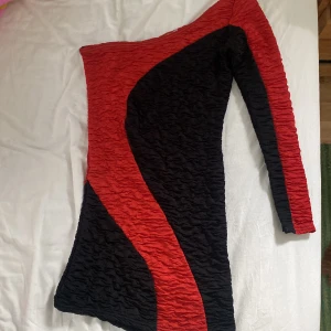 Klänning  - Fint skick, väldigt kort modell