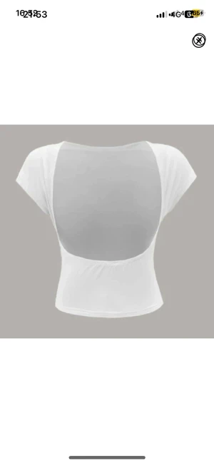 Tröja med öppen rygg - Den fina vita tröjan med öppen rygg, aldrig använd!!! Köparen står för frakt 