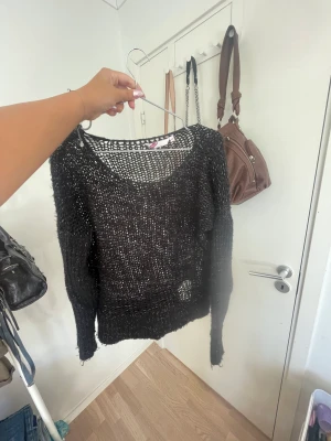 Stickad tröja  - Stickad tröja med glitter