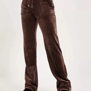 Bruna Juicy Byxor - Säljer mina bruna juicy byxor då de ej kommer till användning. Bra skick