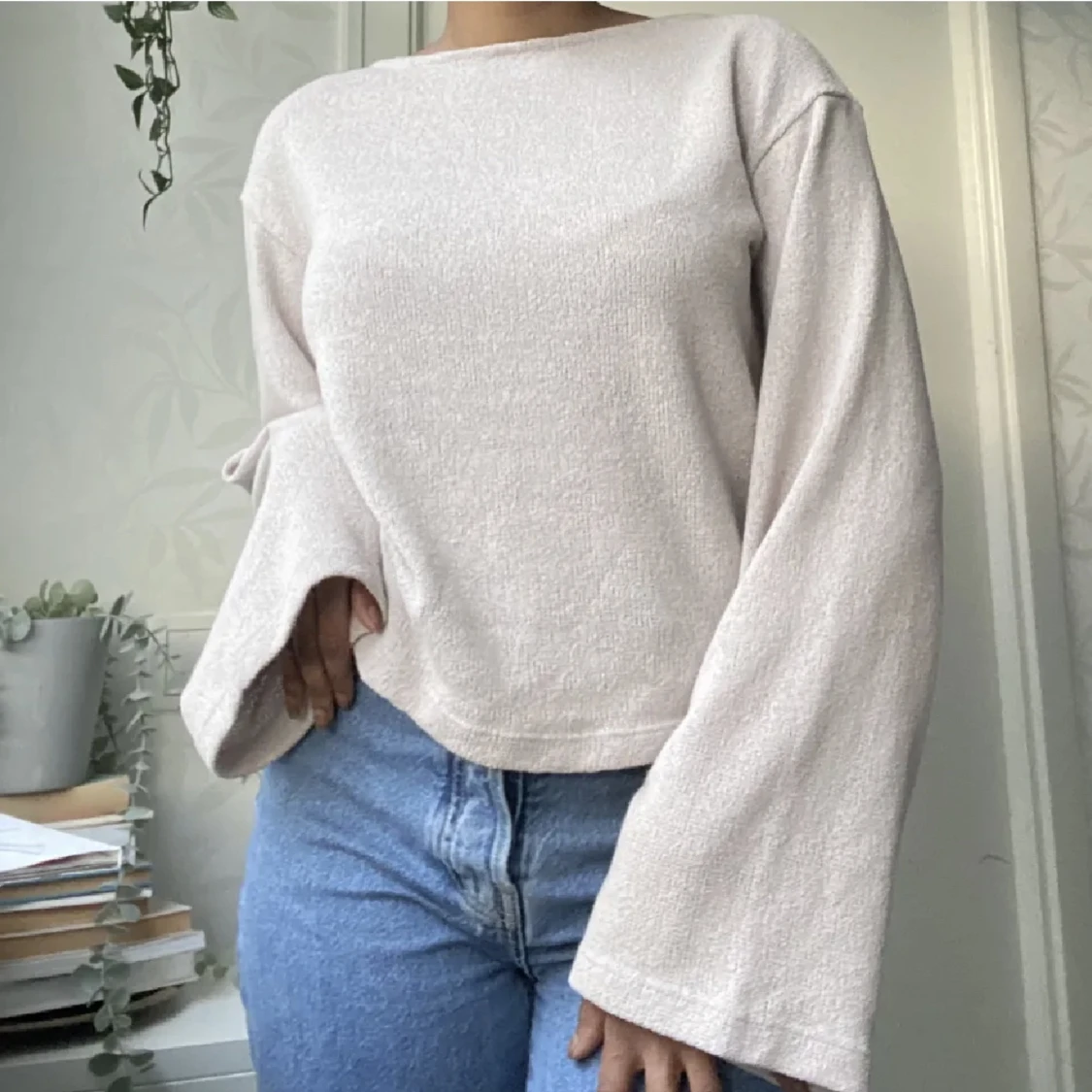 Topp med vida ärmar