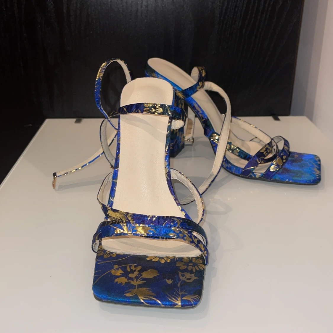 Klackar blå och guld - 91