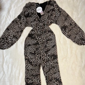 Jumpsuit  - Storlek 43