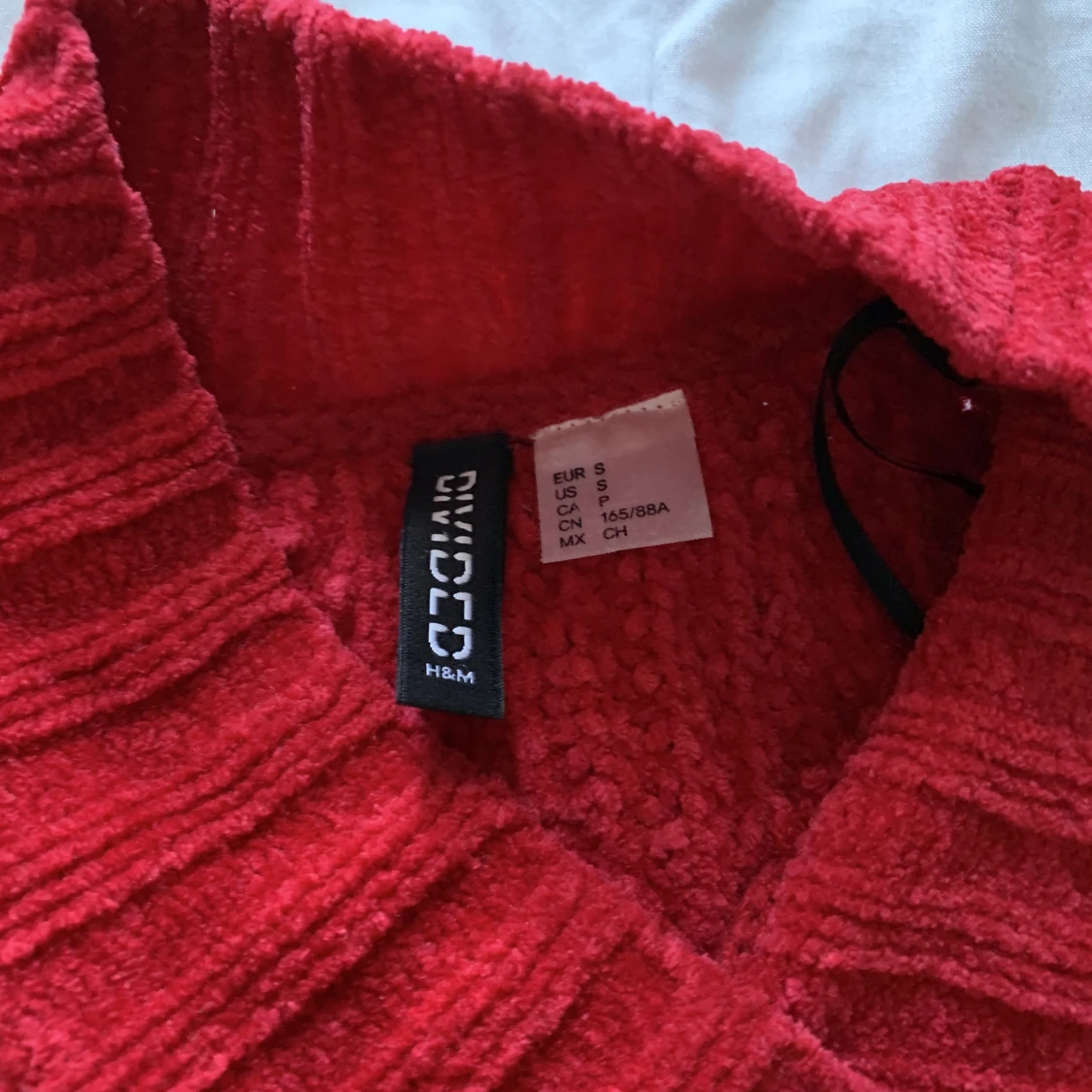 Stickad, röd tröja  - 90