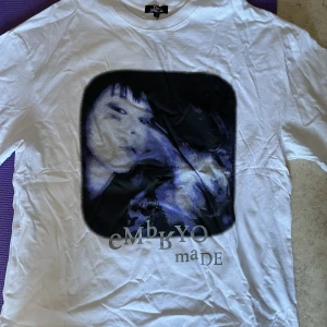 T-shirt with print - Bought on AliExpress Really nice quality. Size M but it’s an oversized style. Used once to try on!