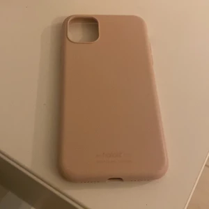 Mobilskal  - Ett fint ljus rosa mobilskal som inte passar min mobil längre.