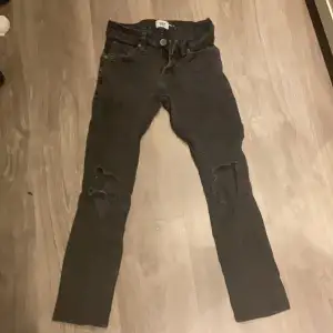 Svarta ripped jeans
