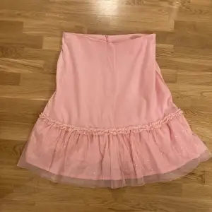 Rosa kjol från flash i storlek L, matchande linne finns i annonsen innan