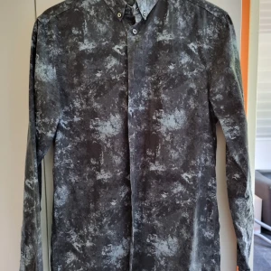 Skjorta melerad - Använd i gott skick
