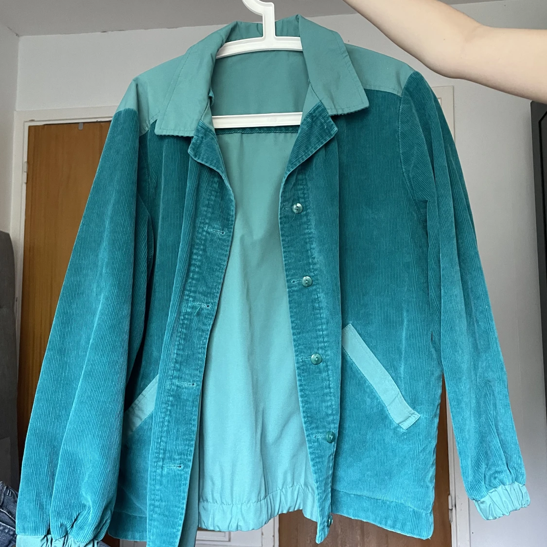 Turkos Manchesterjacka