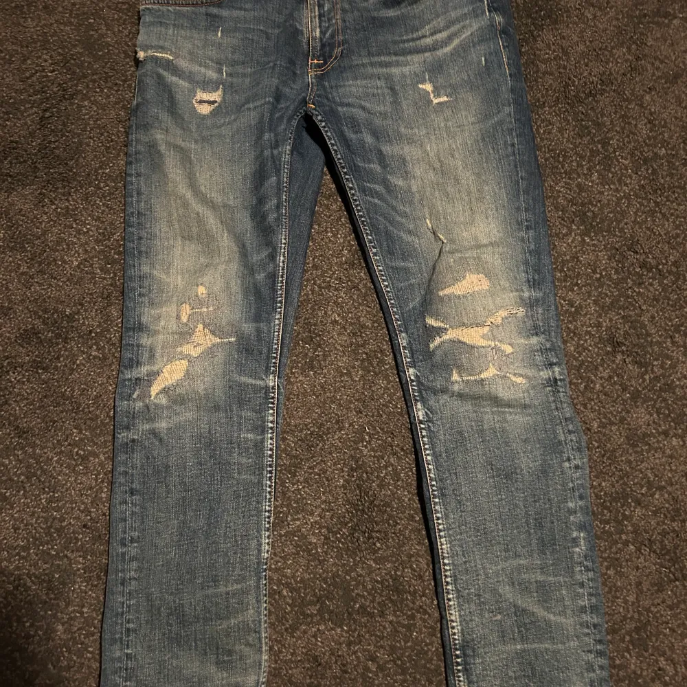 Väldigt snygga nudie jeans i mycket bra skick i strl W32/L30. Jeans & Byxor.