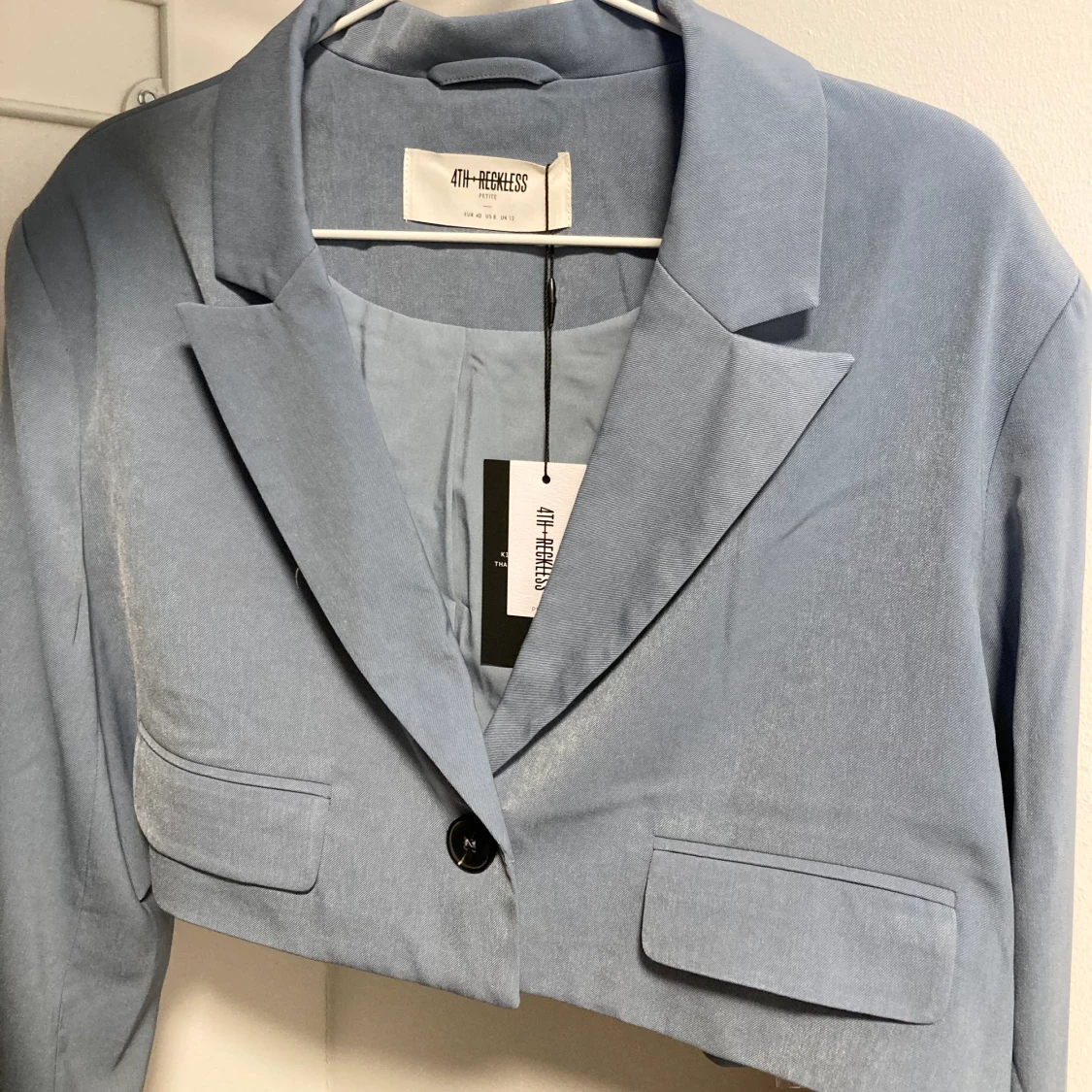 Ljusblå croppad kavaj