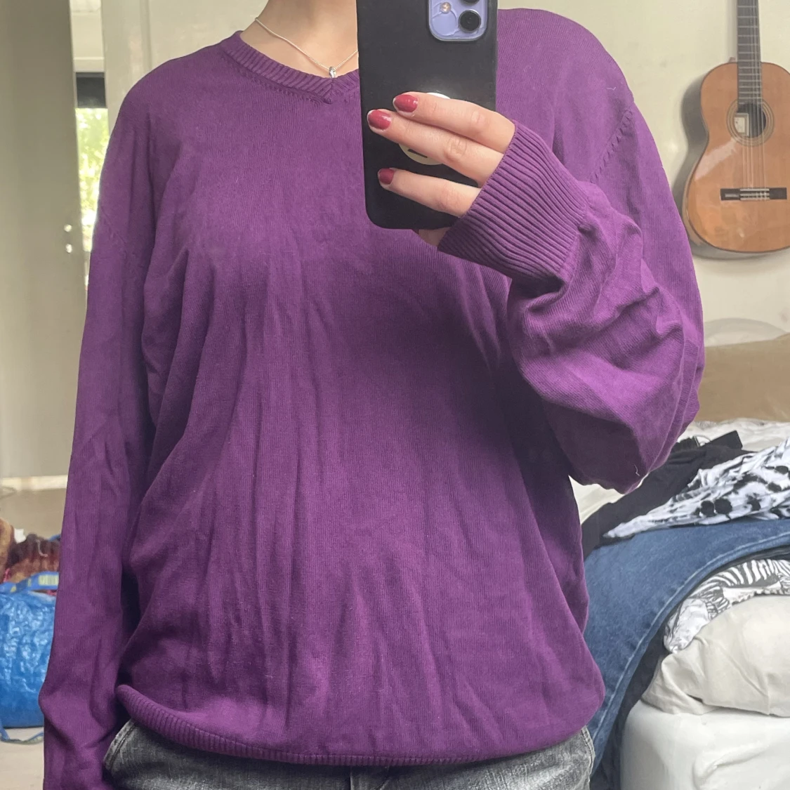 Lila vringad tröja