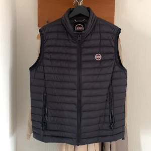 Colmar väst  - Storlek L  Använd fåtal gånger pågrund av att den är för stor 