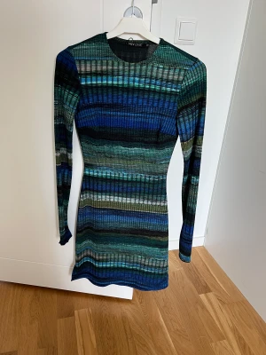 Nelly Klänning - Säljer denna snygga klänning från Nelly i storlek XS. Endast provad, lappen kvar.