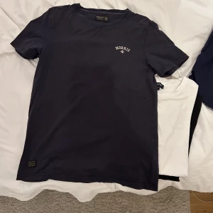Morris t-Shirt  - Fin Morris t-Shirt i fint skick  Säljer pga att den är förliten  Köparen står för frakten!!