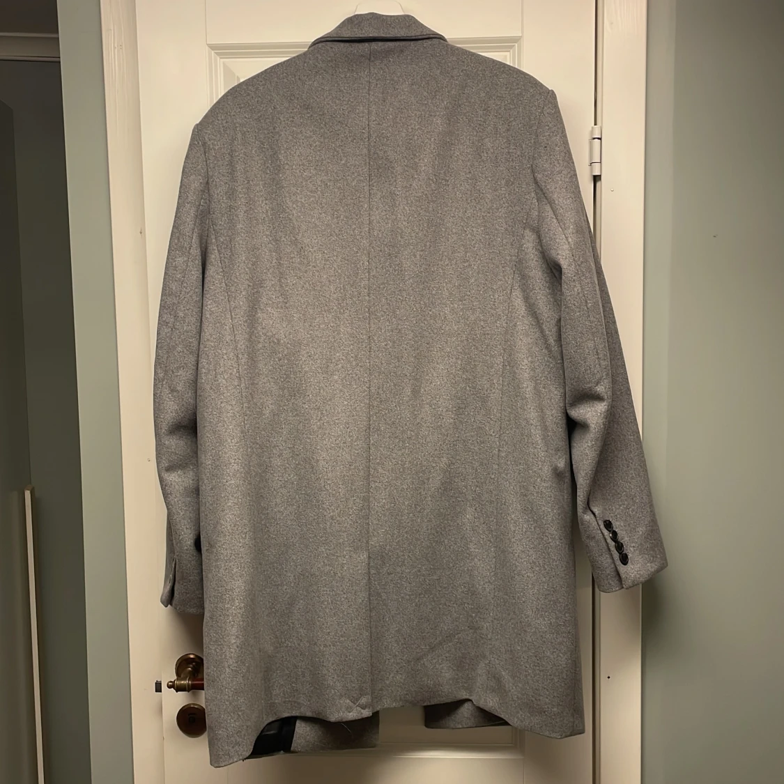 Grå kappa från HM - 90