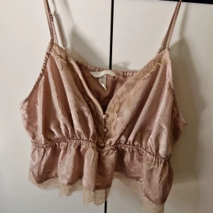 Spetstopp - Sparsamt använd. Mjuk, rosa färg.