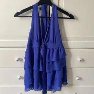 Linne volang - Storlek M, sitter mer som en L