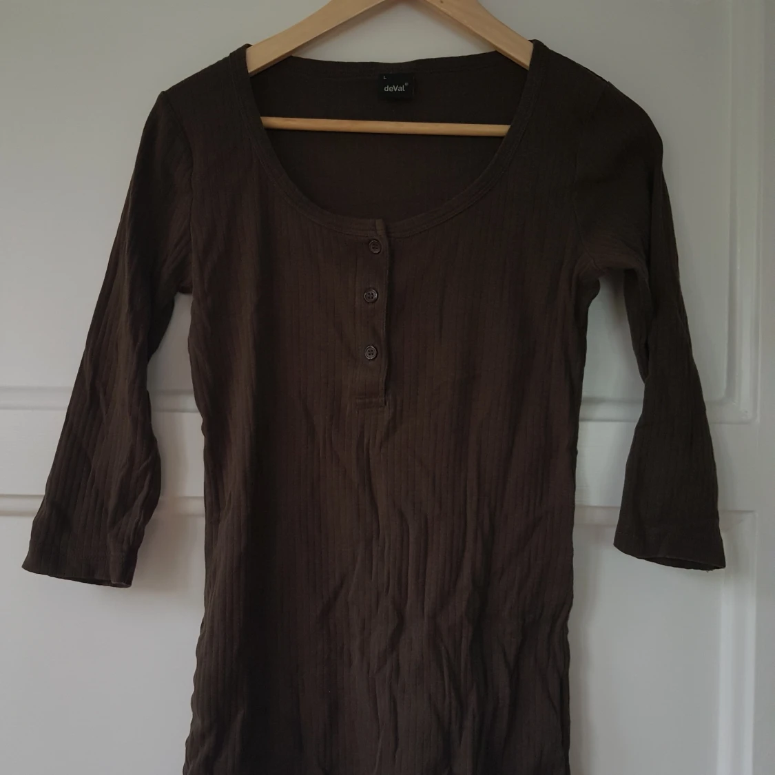 Längre top med 3/4 armar, strlk S-L