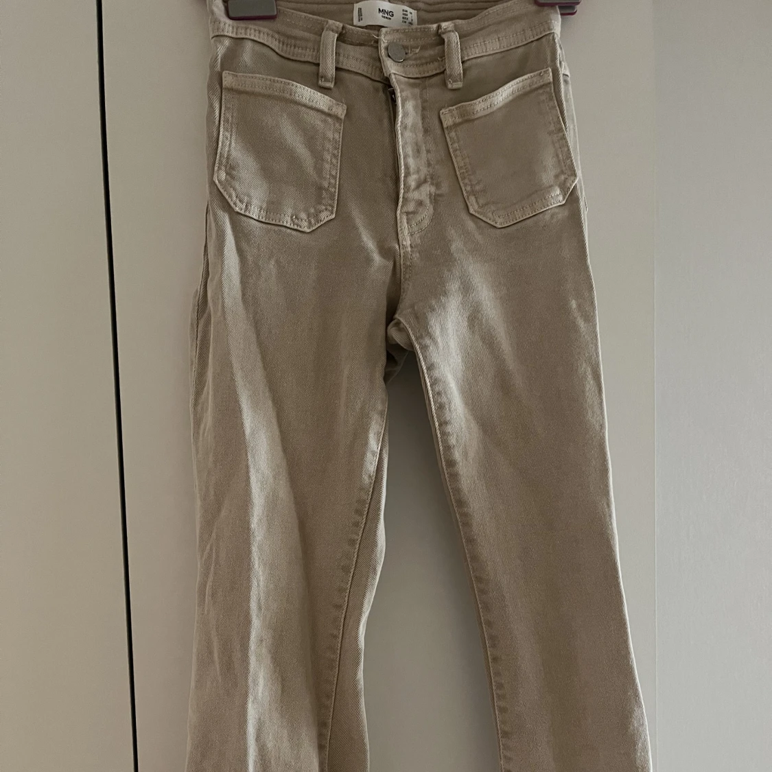 Beige bootcut jeans