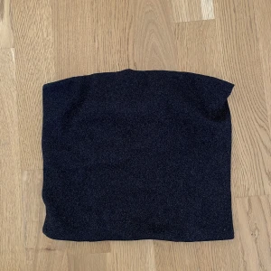 Glittrig svart bandeau - Glittrig, svart, kort bandeau topp