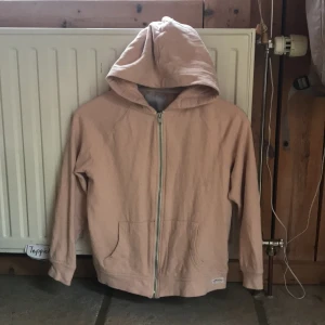 Troia  - Den är rosa. Bra skick! 