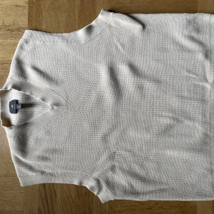 Stickad väst - Ribbstickad väst