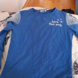 Långärmad frost  - En tröja med frost motiv