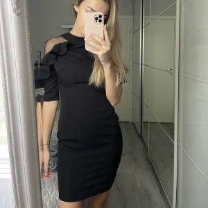 Svartklänning - Superfin svart klänning i storlek Xs-S. 