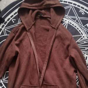 Zip up hoodie , it's a size M but quite oversized and cozy. 