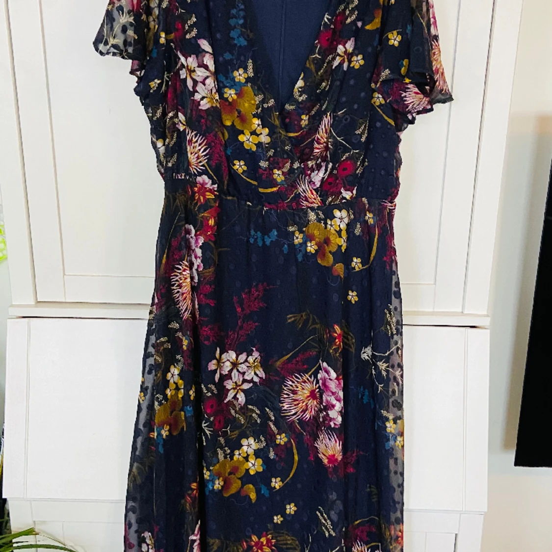 Fin blommig långklänning