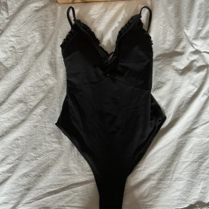 baddräkt - jätte söt bad dräkt från hm, sorgligt nog aldrig använd