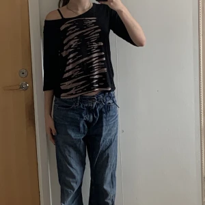 Topp - Snygg topp med 3/4 ärmar. 