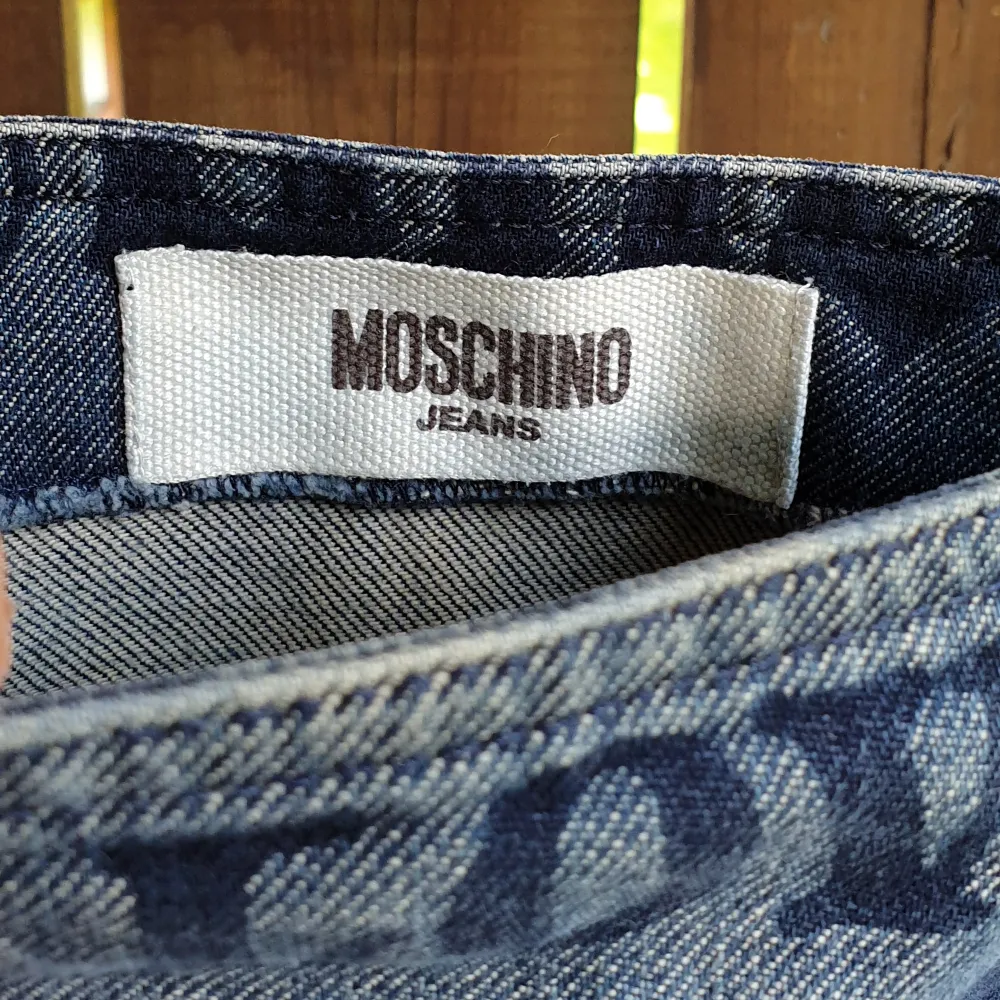 Vintage Jeans Skirt by Moschino Jeans Rare piece, featuring a medieval print  Details - Slit, hidden zipper closure on side  Size: Depending on where you wear it on the hip/waist - size XS for a low waist, size S for mid and size M for a high waist look.. Kjolar.