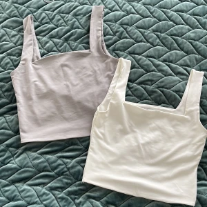 Toppar  - Toppar i vit och grå färg! Båda för 100! 