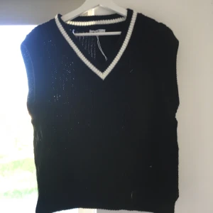 Stickad väst - Aldrig använd, bara testad.