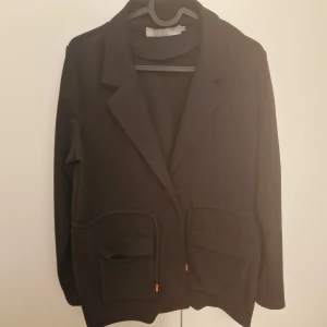 Kavaj  - Mycket bra skick. Sparsamt använd 