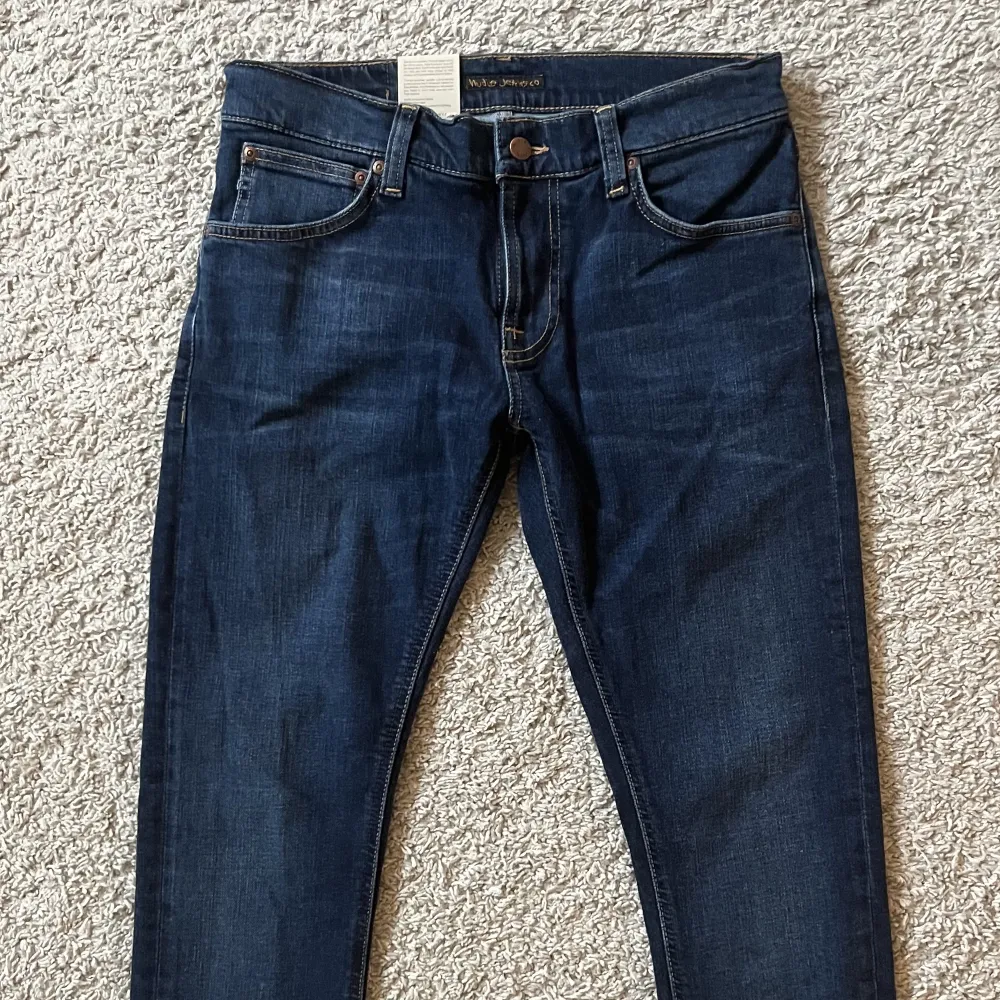 Säljer ett par helt nya Nudie Jeans, storlek 32/32. Skriv vid frågor!. Jeans & Byxor.