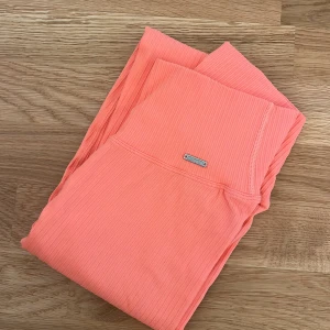 Aimn tights  - Aimn tights i corall, använda en gång. Storlek S 