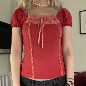 babydoll topp  - cute red babydoll top, has ribbon at the top so you can adjust to your bust!! has no tag but im a size s, so will fit an xs-m