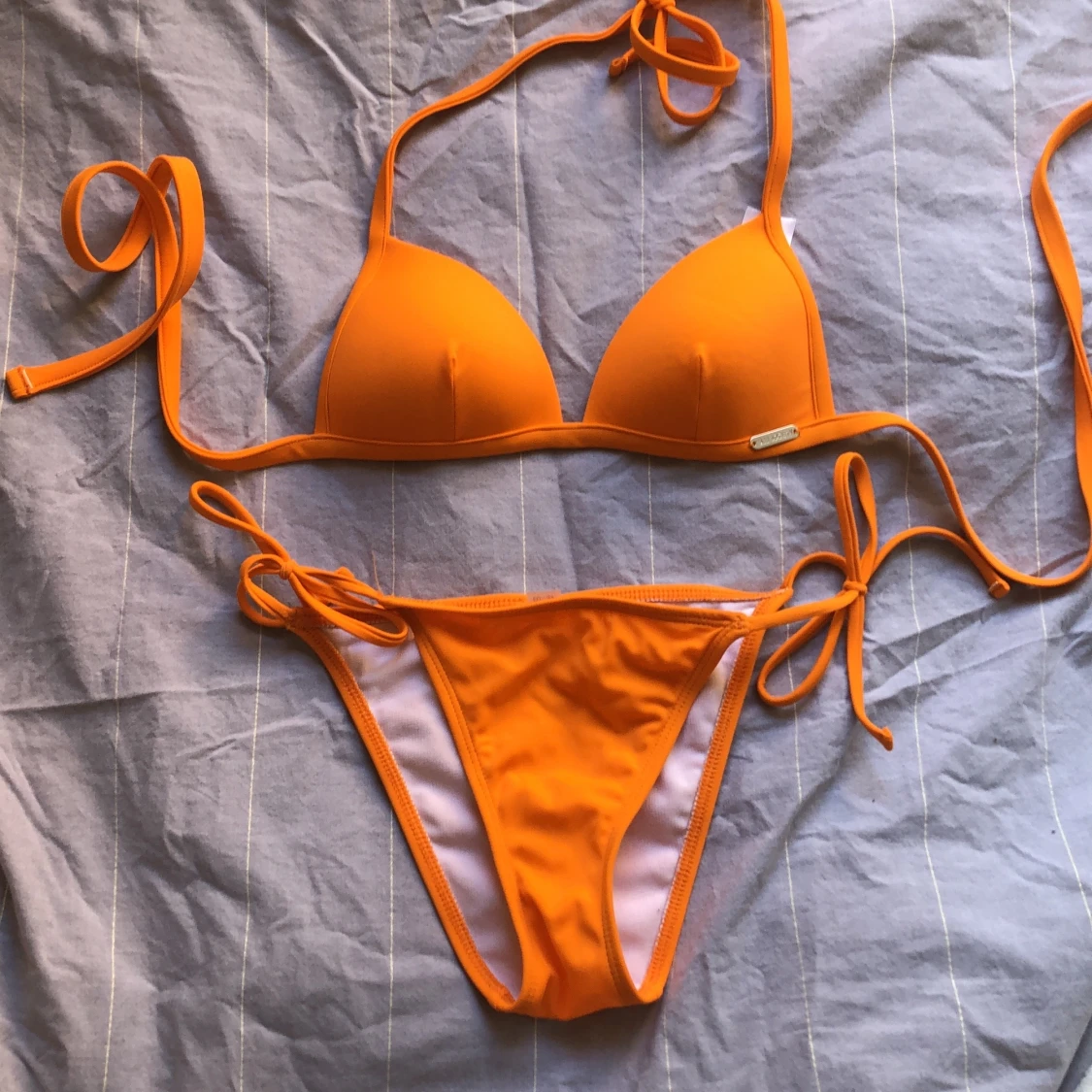 Orange bikini, free society