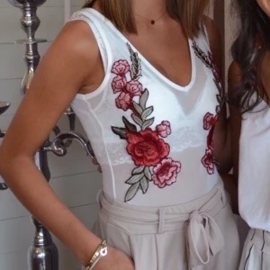 Body från Nelly strl XS - Så fin body i nyskick från Nelly, endast använd 1 gång!💕 köparen står för frakt