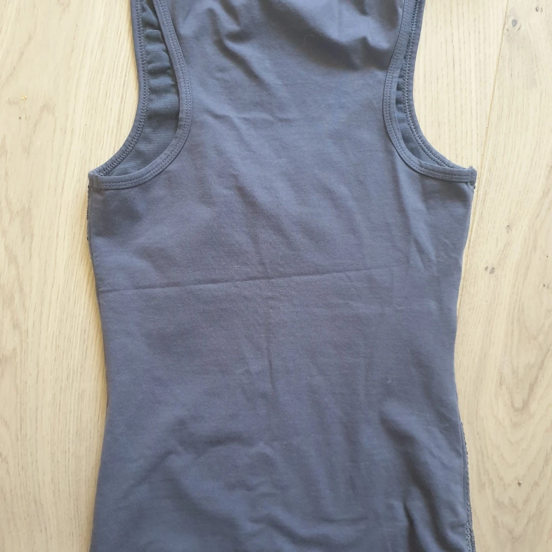 MOTIVI Topp i storlek XS/ S i paljetter - 90