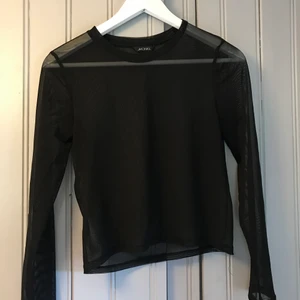 Meshtopp - Svart meshtopp från Monki