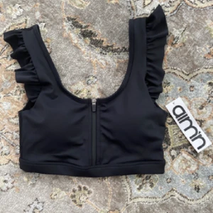 AIMN helt by sports bra - helt ny, only tried on, too small for my chest, paid 449kr new. SLUTSÅLD.