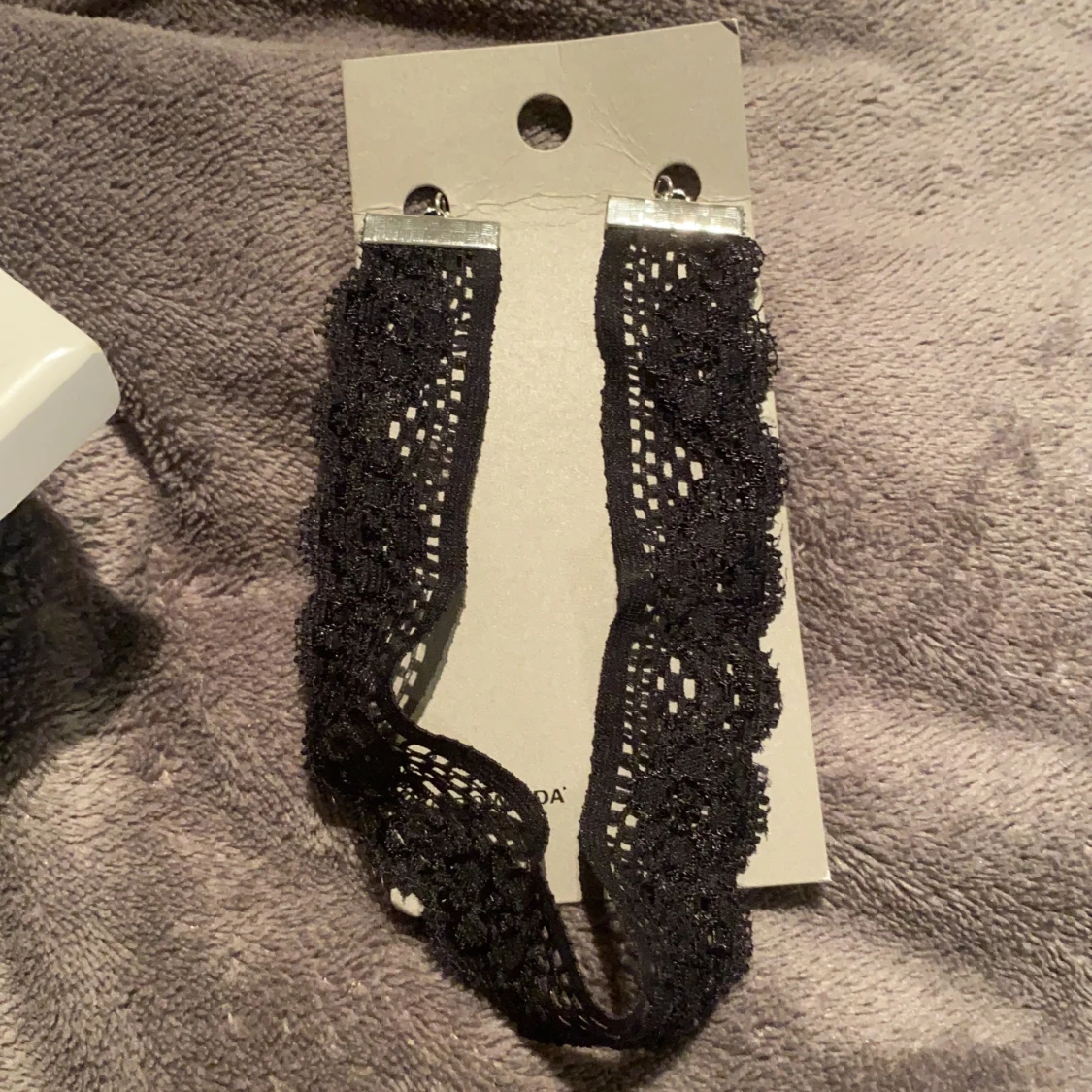 Chocker i spets oanvänd