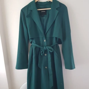  - Long, green autumn/spring coat from Monki. I have mended some holes in the pockets but otherwise good condition. 
