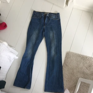  - Acne bootcut jeans
