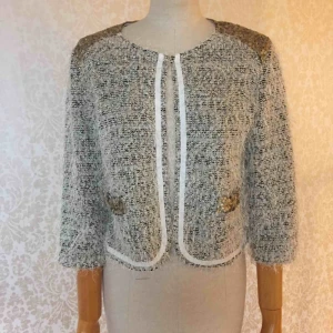  - Kavaj med guldpaljet